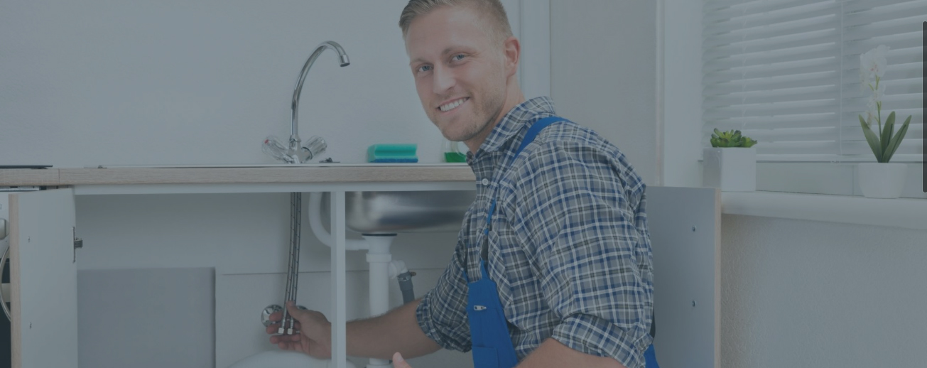 New tank water heater installed with professional plumbing connections